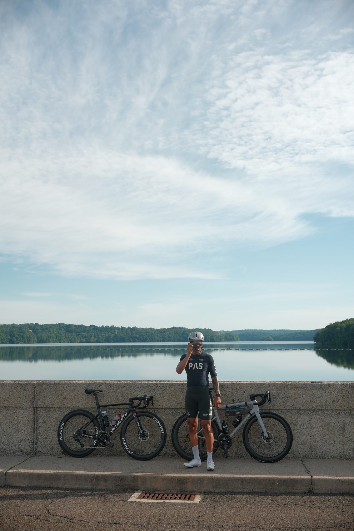A rider pausing at the reservoir on a Fool's Gold summer ride